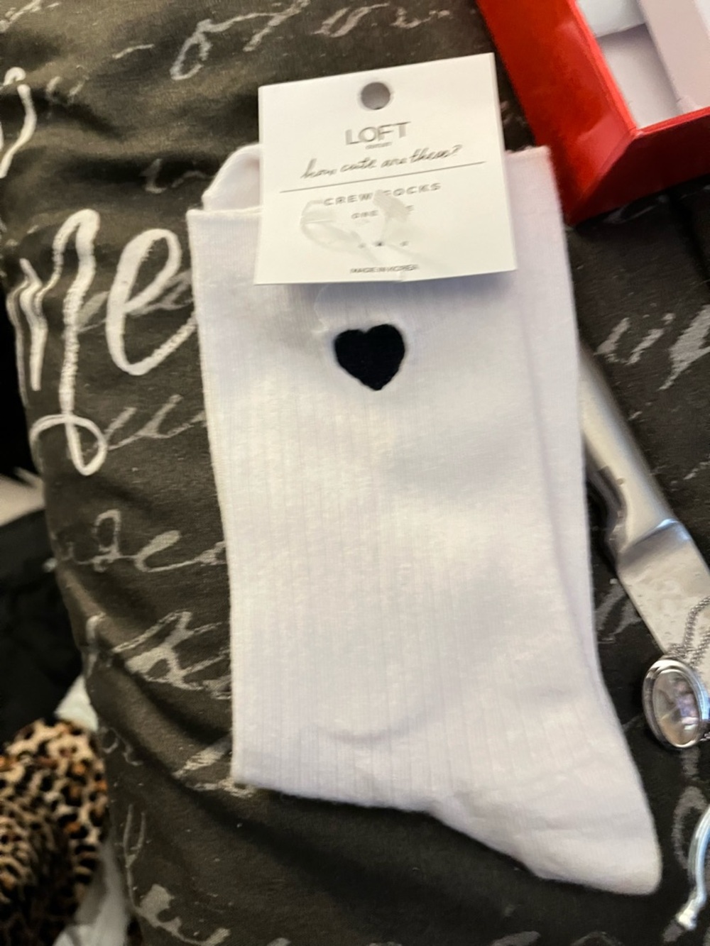LOFT White Crew Socks with Black Heart Accent this is at its lowest price